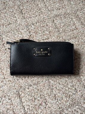 kate spade Black Pebbled Leather Zip-Around Wallet with Gold Plaque